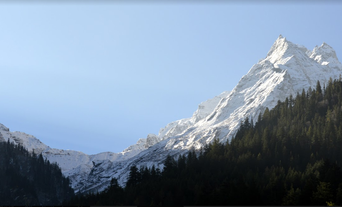 snow covered peak from harsil